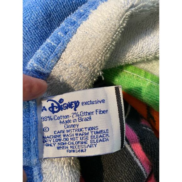 Beach towels it is a big and it a Disney towel has several characters on it - Picture 2 of 4